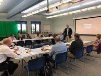 Dr. Eddie Hooker with Steering Committee